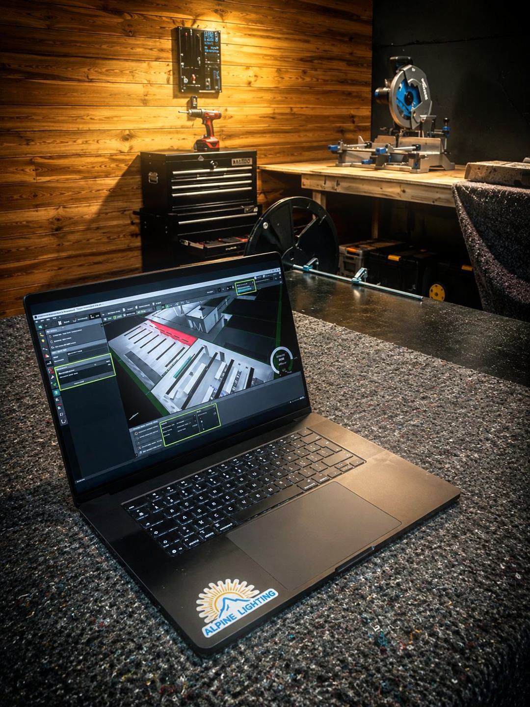 Étude d'implantation lumière sur ordinateur dans l'atelier Alpine Lighting